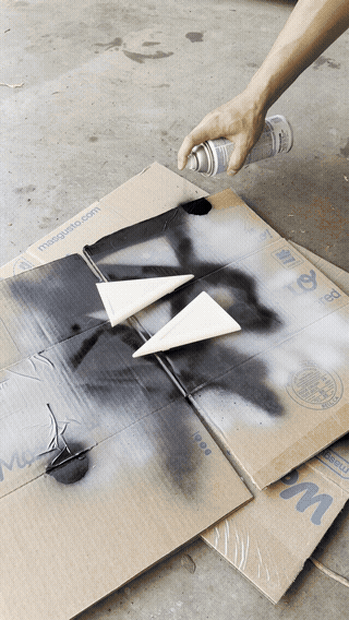 Spray painting with clear gloss black.