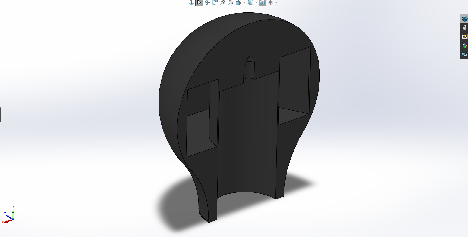 Internal pockets in the knob shell that accept or omit the steel weights for the two effective weights.