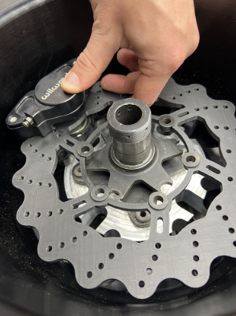 3D printed rotor test fit — checking clearance against the hub, upright, and caliper mounting before committing to material.