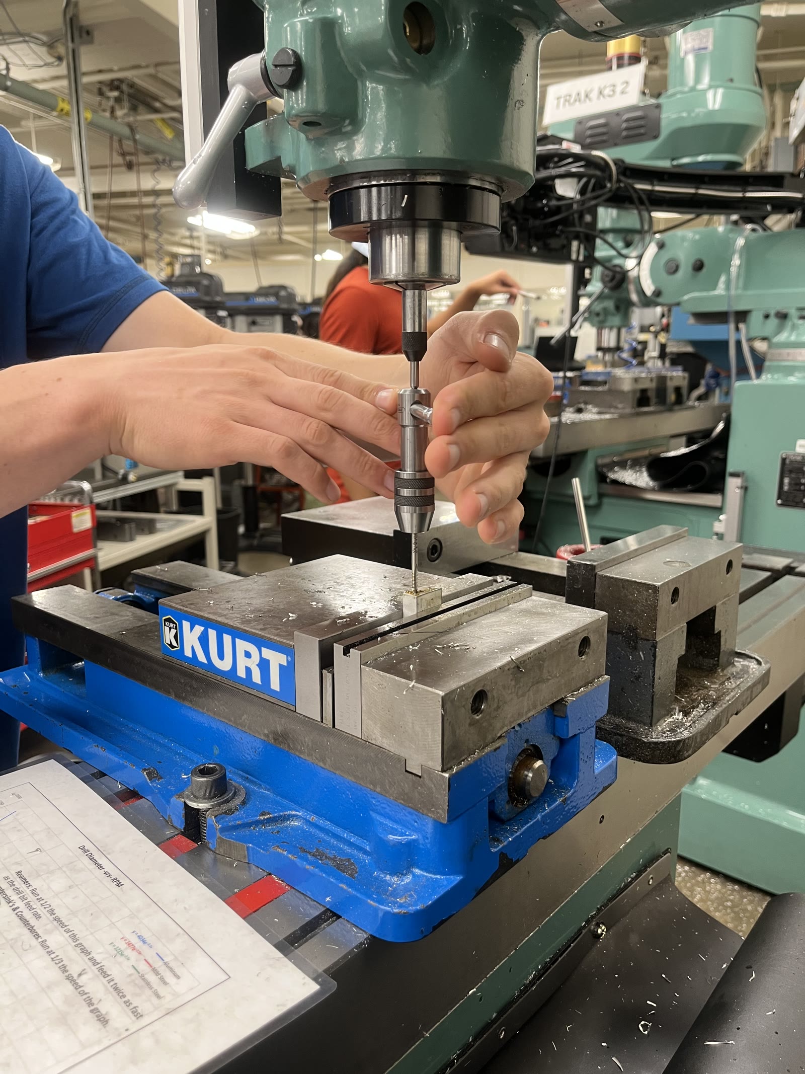 Tapping holes on the mill — finishing threaded features in house after waterjet cutting the profiles.